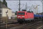 143 820-9, fhrt einen Schttgutwagenzug in Hannover HBF am 10.08.10 ein.