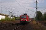 143 870-4 mit der S1 nach Dortmund Hbf bei der Einfahrt inDsseldorf-Eller am 17.0.4.2011