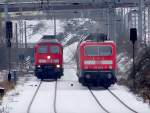 143 841-5  &  232 024-0 begegnen sich auf der Strecke nach Rgen.