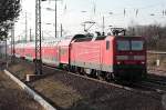 143 868-8 mit einem Regionalzug der Linie RB 7 (RE 18723) von Blankenfelde(Teltow-Flming) nach Berlin Schnefeld Flughafen passiert am 16.