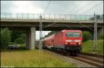 143 303 als S2 aus Gstrow ber Rostock Hbf nach Warnemnde. Aufgebommen am 19.06.2011 zwischen den Hp Plchow und Papendorf. Im Hintergrund zu sehen die A20.