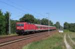 143 556-9 dste am 28.06.2011 mit dem RE10 (Cottbus -> Leipzig Hbf) durch Lindthal. In wenigen Minuten wird er den Bahnhof Finsterwalde(Niederlausitz) erreichen.