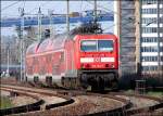 143 254-1 fhrt mit der RB33327 nach Sassnitz. Der Bhf Stralsund -Rgendamm ist fast erreicht.   (am 01.05.06 )