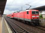 143 033-9 am 15.07.2012, mit einem RE nach Leipzig, im Bahnhof Riesa.