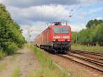 143 877-9 am 22. Juli 2012 - Ausfahrt aus dem Bahnhof Knigs Wusterhausen mit RB 14 (RB 28759) nach Senftenberg. 