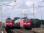 143 173 mit dem RB 17479 Elsterwerda-Biehla - Dresden kreuzt den Gegenzug RB 17480 geschoben von 143 243; Dresden-Niederwartha, 20.09.2012  