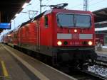 Die ex.Cottbusser 143 065-1 mit S1 von Rostock Hbf nach Warnemnde kurz vor der Ausfahrt im Rostocker Hbf.17.02.2013