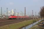 143 330 mit der S6 (Dsseldorf-Rath - Kln-Nippes) in Dsseldorf-Derendorf am 30.03.13