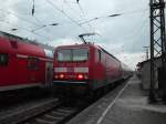 143 891-0 wartet am 22.03.2014 im Bahnhof Falkenberg/Elster auf ihre Abfahrt in Richtung Dessau.