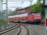 143 360 mit einen RE aus Hof nach Dresden bei der Einfahrt in den Bahnhof Reichenbach(Vogtl.)27.04.2014.