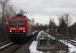 Am 02.01.2015 fährt die 143 116-2 mit ihrem RE 4789 (Hof Hbf - Dresden Hbf) durch den Haltepunkt Zwickau-Pölbitz.