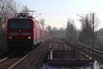 Die 143 205-3 durchfährt am 07.02.2015 mit dem RE 4769 (Hof Hbf - Dresden Hbf) den Haltpunkt Zwickau-Pölbitz seinen nächsten Halt in Glauchau (Sachs) entgegen.