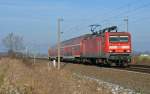 143 348 passiert mit einer RB aus Falkenberg(E) nach Leipzig am 07.02.15 Zschortau.