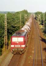 143 111 mit Gterzug Richtung Hamburg am 22.07.1996 in Ashausen