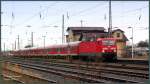 Am Nachmittag ist 143 658 nochmal mit RE17192 Cottbus - Leipzig Hbf unterwegs. Hier beim Halt im Bf Torgau. 12.02.07