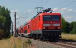 Die Trierer 143 910 fuhr am 06.07.15 mit einem RE von Magdeburg nach Leipzig durch Greppin.