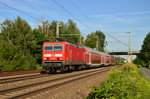 Regionalbahn von Aschaffenburg nach Wiesbaden, gezogen von der 143 267 hier ist sie unweit des Bahnhofs Groß Gerau.