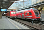 143 193-1 von DB Regio Nordost als RE 18440  Striezelmarkt-Express  von Berlin Südkreuz nach Dresden Hbf trifft auf DBpbzfa mit Schublok 112 186 von DB Regio Nordost als RE 3343 (RE3) von Schwedt(Oder) nach Lutherstadt Wittenberg Hbf im Bahnhof Berlin Südkreuz.
[8.12.2018 | 8:41 Uhr]