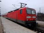 143 273-1 steht am 26.01.2009 mit RB 36212 nach Braunschweig Hbf auf Gleis 9 im Hauptbahnhof Magdeburg.