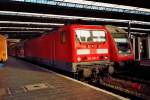 143 265-7 mit RB nach Landshut im letzten Abendlicht, Haupthalle des Mnchner HBF im Oktober 2006