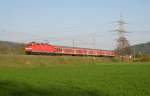 Eine 143 ist am 18.04.11 mit einer RB nach Saafeld(S) bei Gundelsdorf unterwegs.