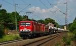 MEG 602 (143 204-6) u. 705 (155 196-9) mit einen Zementzug bei Vollmerz am 03.06.14.