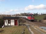 MEG 603 (91 80 6143 851-4 D-MEG) und 247 042 zogen am 03.03.15 einen Zementzug durch Jößnitz.