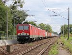 143 179-0 (MEG 601) in Doppeltraktion mit 143 344-0 (MEG 605) und Containerzug in Fahrtrichtung Norden. Aufgenommen am Haltepunkt Dessau-Süd am 30.08.2014.