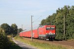 607 (ex-DB 143 310-1, Baujahr: 1987)  der MEG (Mitteldeutsche Eisenbahn GmbH) mit einem Güterzug Emden-Osnabrück bei Leschede am 2-10-2015.