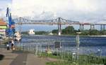Mal was anderes von mir: Hochbrücke Rendsburg mit einem SH-Express und einer 143, fotografiert am 26.08.2012.