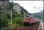 DB 143058-6 fährt hier am 27.08.2006 mit dem RE nach Bad Schandau in Königsstein ab.