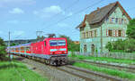 143 160 passierte am 29.5.05 mit einem RE nach Stuttgart den früheren Bahnhof Ellrichshausen.