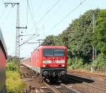 143 276-4 mit RB 21225 von Neumünster nach Hamburg-Altona bei der Einfahrt in Elmshorn am 09.07.2013