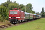 243 005-6 mit Leerzug von Warnemünde nach Rostock-Bramow bei der Durchfahrt in Rostock-Lichtenhagen.07.08.2021