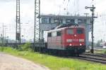 151 169-0 in der Gterzugumfahrung Gremberg Gbf. Sie macht sich mit ihrem Stahlplattenzug auf den Weg Richtung Kln-Kalk. Das nchste Gewitter braute sich zusammen... (04.05.09).