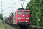 Die 151 086-6 in orientrot aus Aachen West kurz hinter Geilenkirchen am 06.06.2009