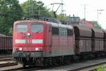 Die 151 162-5 zieht einen Kohlezug durch Kln West am 29.07.2009