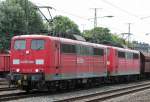 Eine Doppeltraktion BR 151, davon 151 119-5 fhrend, ziehen einen Kohlezug durch Kln West am 29.07.2009