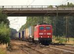 151 049-4 poltert am 15.08.09 mit einem Kombizug aus Lbeck-Skandinavienkai durch Radbruch Richtung Sden.