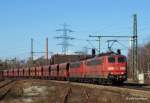 AK 151 095-7 und AK 151 096-5 poltern am 19.03.11 mit einem Erzpendel von Hamburg-Hansaport nach Salzgitter-Beddingen durch Hamburg-Unterelbe Richtung Sden.