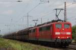 151 151+151 041 am 16.7.11 mit einem Kohlezug bei der Durchfahrt durch Ratingen-Lintorf.