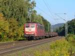 Die orientrote 151 134-4 zieht einen Stahlzug am 28.09.2011 durch Landstuhl  