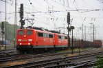 151 063-5 von Railion und 151 066-8 von Railion und fahren mit einem Kohlenzug aus Antwerpen-Zandvliet(B) und fahren nach Dillingen(an der Saar) Aufgenommen in Aachen-West  bei Regen am 4.6.2012.
