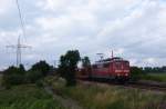 151 022-1 fuhr am 17.07.2012 mit einem Gterzug von Emden nach Osnabrck, hier sdlich von Leer.