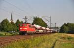 151 053 mit einem Autozug von Audi auf der Main-Spessart-Bahn in Richtung Gemnden.Aufgenommen bei Thngersheim am 24.7.2012