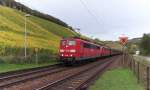 151 164-1 in Railion Beschriftung und eine weitere 151er mit DB Logo waren bei Kanzem mit ihrem Leerzug in Richtung Rheinland und Ruhrgebiet unterwegs.

Im Wingert von Gnther Jauch links im Bild hingen noch die Trauben, entweder fr eine Spt- oder Auslese oder man wartet sogar auf den Frost fr einen Eiswein.

26.10.2013 - Kanzem - Bahnstrecke 3230 Saarbrcken - Karthaus 