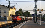 151 132-8 DB kommt aus Richtung Aachen-West,Laurensberg,Richterich,Kohlschid durch Herzogenrath mit einem Kalkzug aus Marche-les-Dames(B) nach Hagen-Halden(D) und fährt in Richtung Hofstadt,Finkenrath,Rimburg,Übach-Palenberg,Zweibrüggen,Frelenberg,Geilenkirchen,Süggerrath,Lindern,Brachelen,Hückelhoven-Baal,Baal,Erkelenz,Herrath,Beckrath,Wickrath,Rheydt,Mönchengladbach. 
Aufgenommen vom Bahnsteig 2 in Herzogenrath.
An einem schönem Sommerabend am Abend vom 8.9.2016.