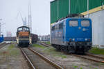HSL Lok 295 023 auf Rangierfahrt im Nordhafen von Stralsund, dort wurde auf einem Nebengleis die EGP Lok 151 118 abgestellt.