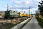151 124-5 von SRI mit Schotterwagenzug (leer) bei Eimeldingen am 18.02.2020