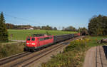151 167 fährt mit einem Stahlzug bei Vogl in Richtung Freilassing, aufgenommen am 19.